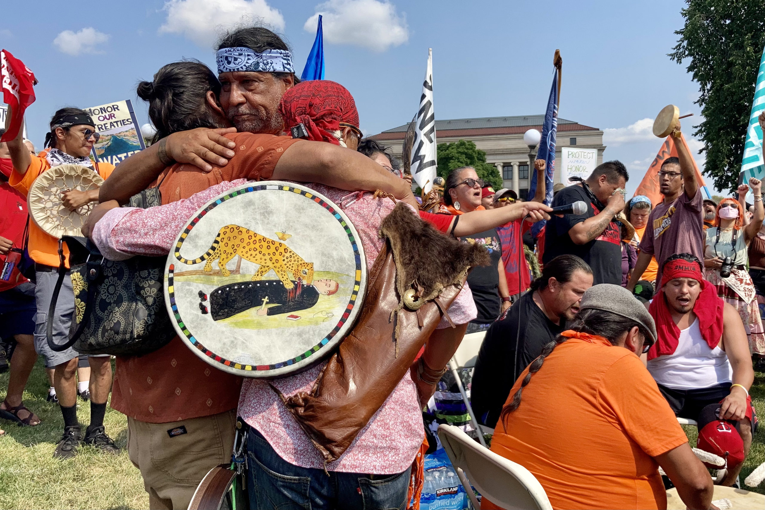 Treaty People Walk for Water organizer Joe Morales (Yaqui) embraces fellow water protectors at the conclusion of the 259 mile walk.